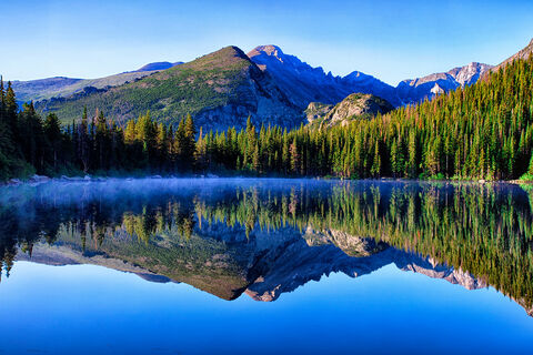 Blue lake at the foot of the peaks