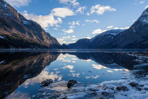 Clouds reflected in a fjord
