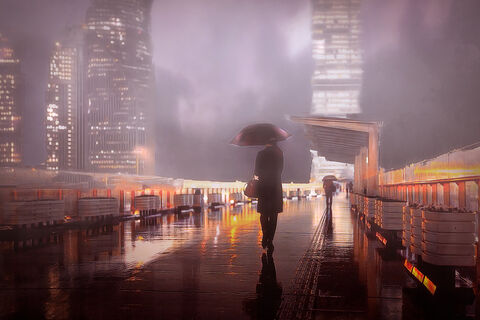 Rainy evening among city towers