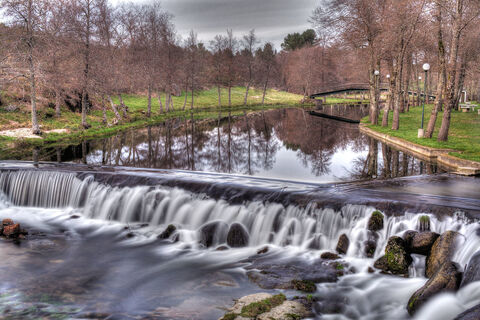 Weir on a river in a park